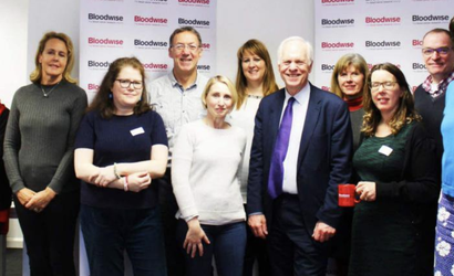 Members of the  Blood Cancer UK Policy panel poses together at the end of a meeting.